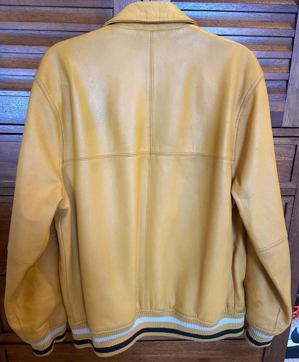 Supreme Uptown Studded Leather Varsity Jacket In Yellow